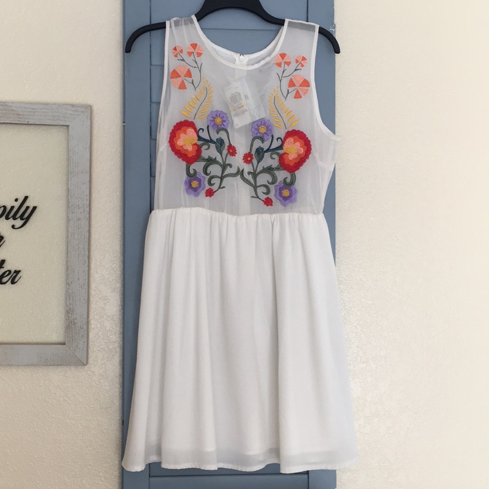 White embroidered dress.